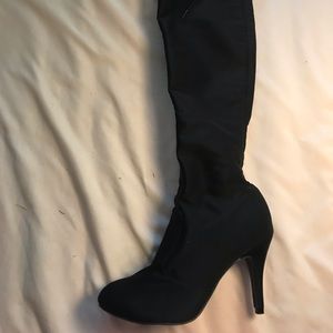 Knee high sexy black stiletto boots